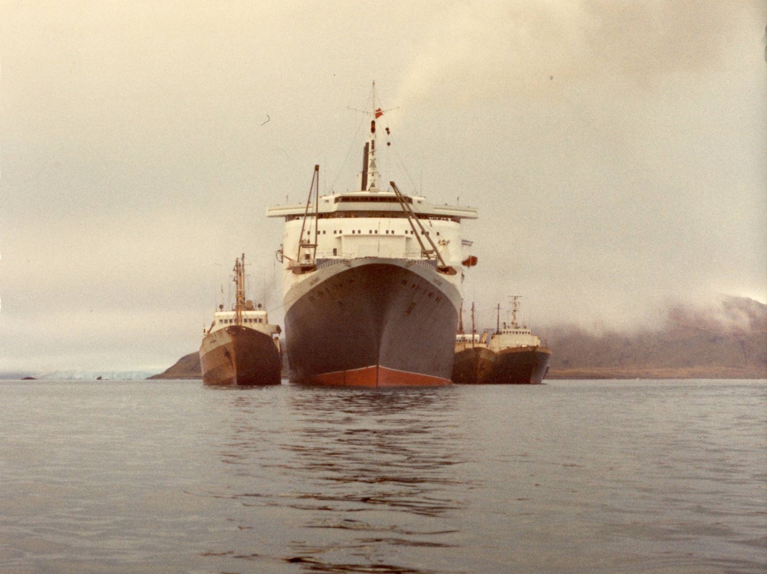 trawlers alongside QE2